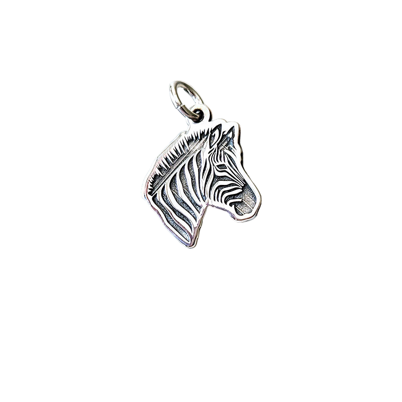 Silver zebra head pendant on a white background