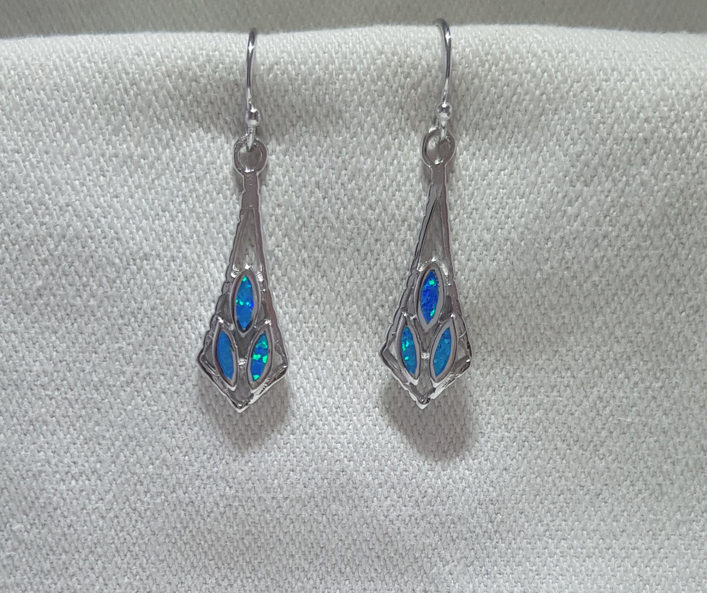 Exquisite trio inlay crushed opal drop earrings, featuring a cascade of vibrant colors.