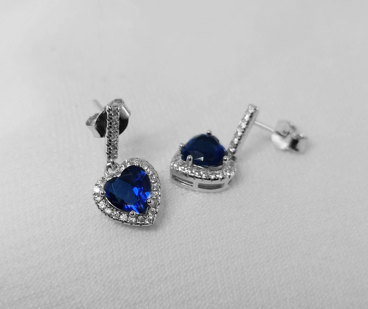 sterling silver heart earrings witha blue cubic zirconia stone
