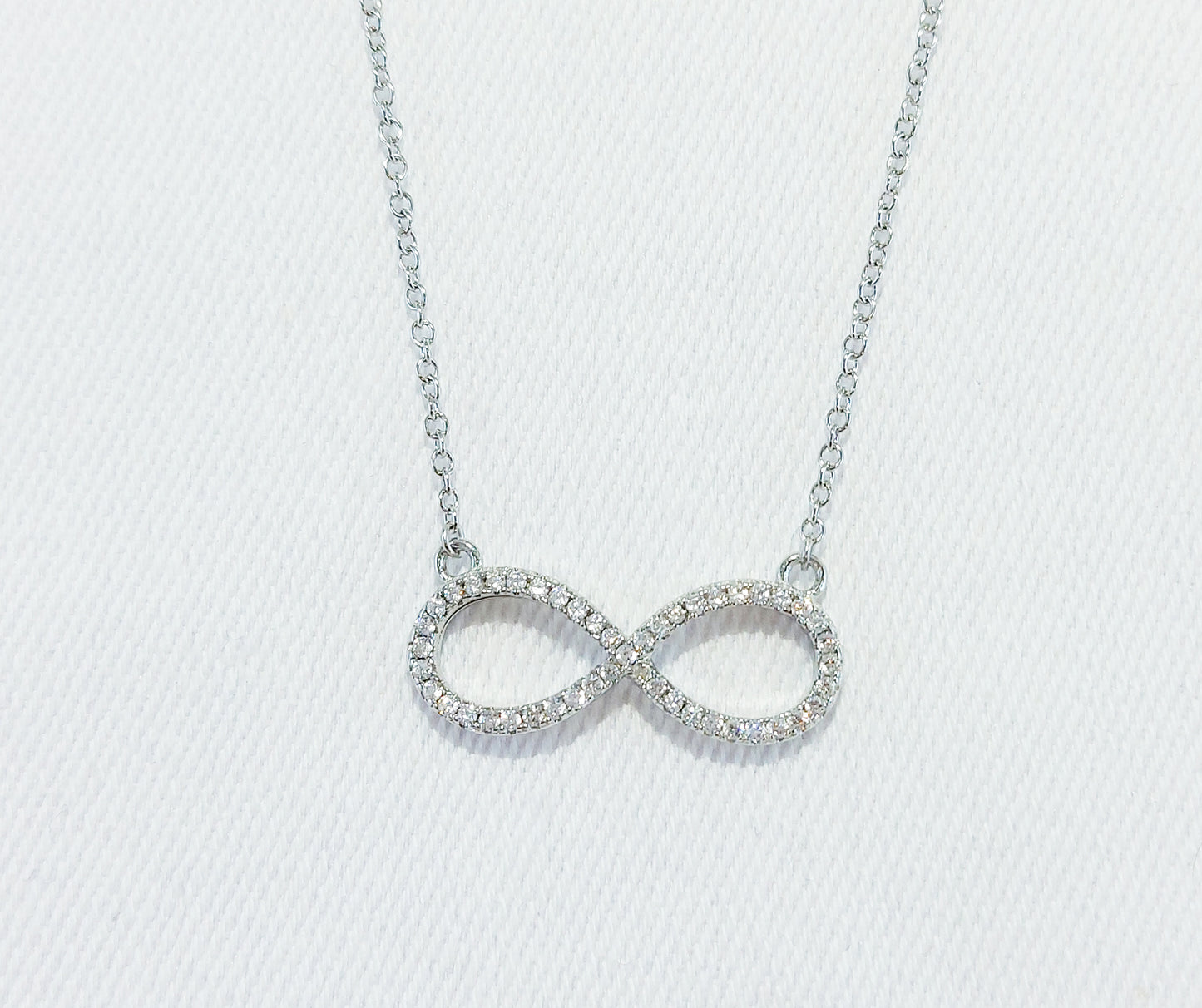 sterling silver infinity necklace with cubic zirconia stones