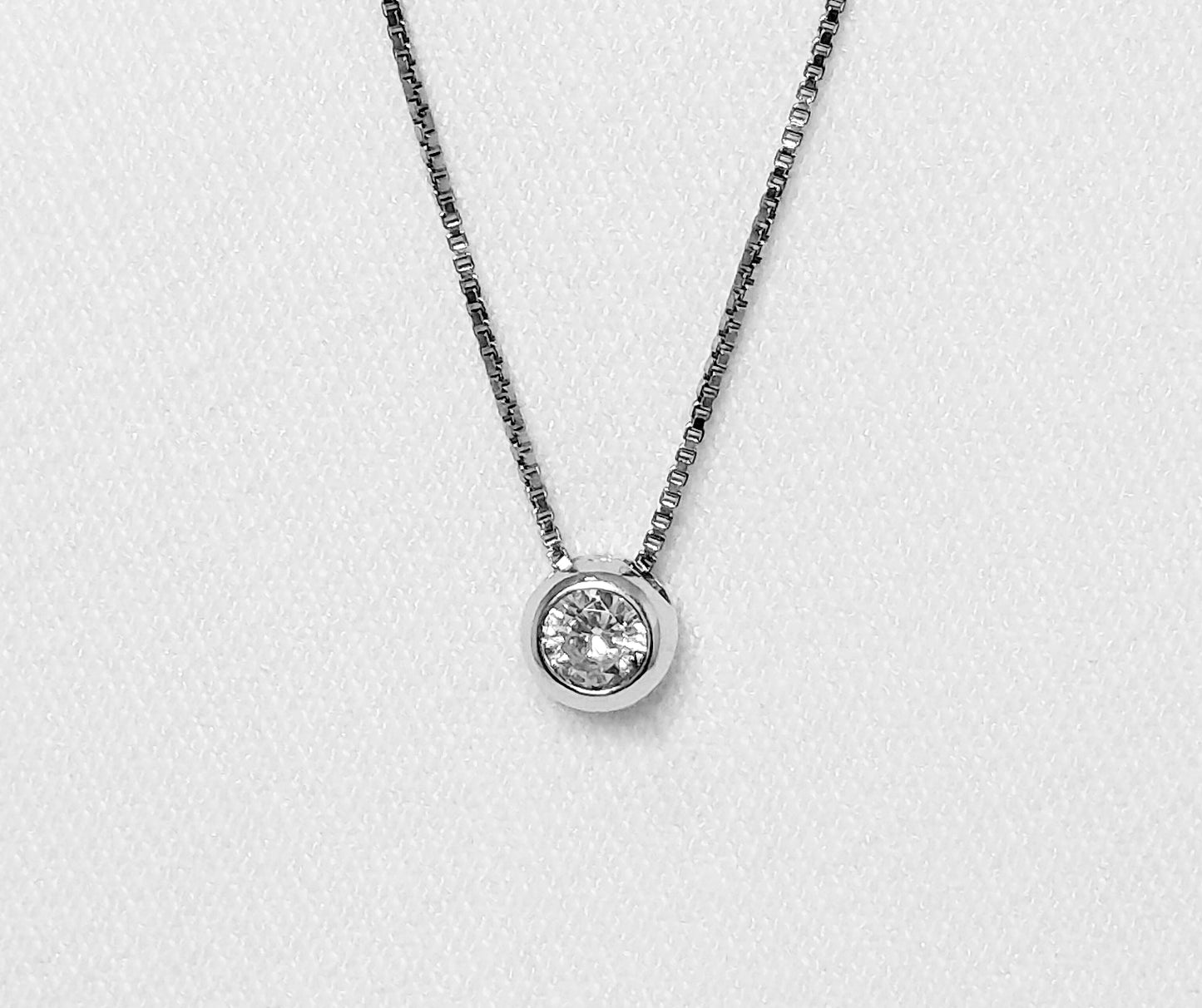 sterling silver necklace with cubic zirconia stone.