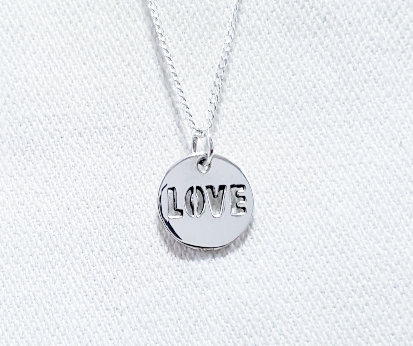 "Love" Disc Pendant Sterling Silver