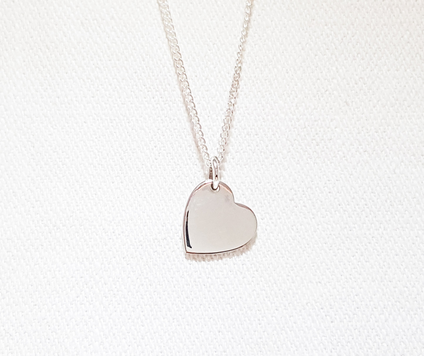 Lopsided Silver Heart Disk Pendant