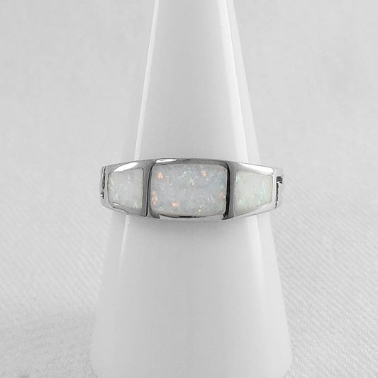 Silver ring with white opal inlay