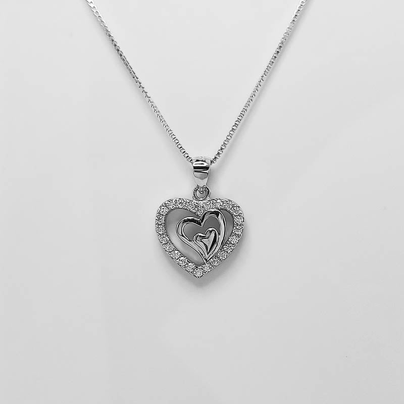 Sterling silver heart pendant that has been encrusted with cubic zirconia stones