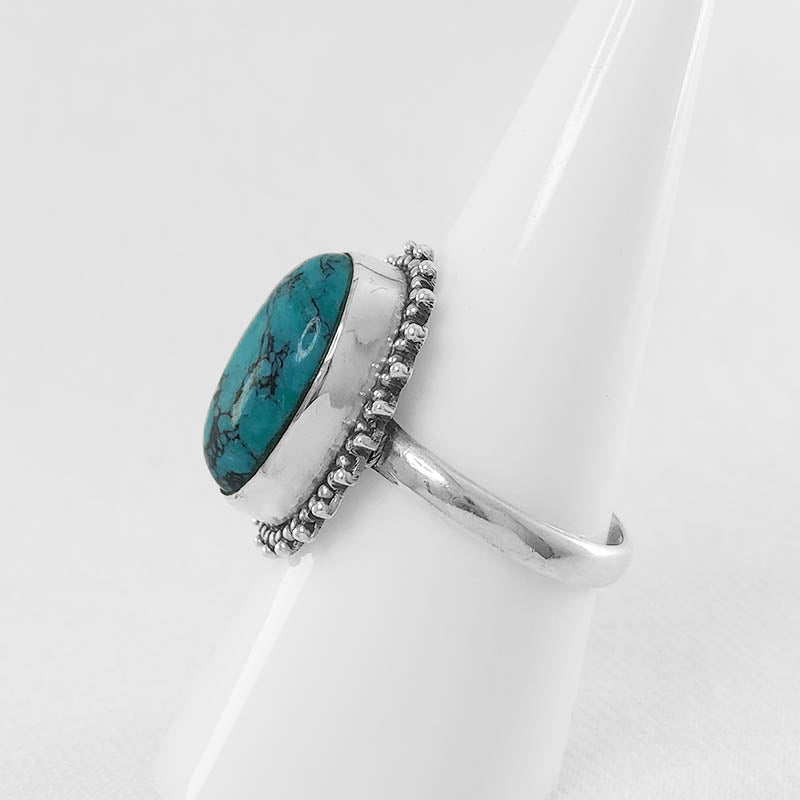 Large turquoise ring made with sterling silver