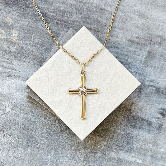 Yellow and White Gold Cross Pendant. Made with 9 carat gold and available with an optional gold chain