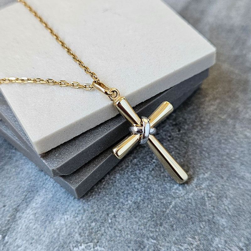 Yellow and White Gold Cross Pendant. Made with 9 carat gold and available with an optional gold chain