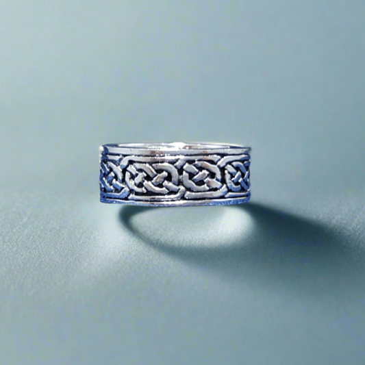 silver wedding ring for men with a Celtic pattern