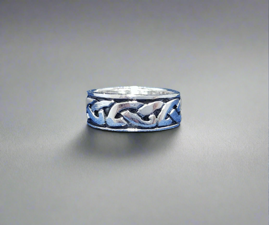 A striking Celtic ring with a bold and intricate design.