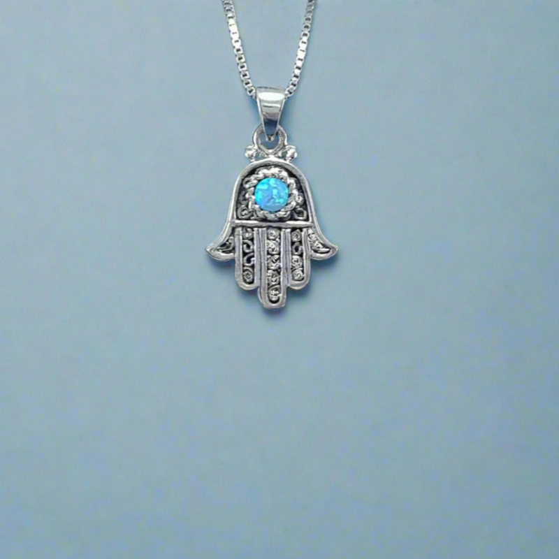 Sterling Silver Hamsa Hand Pendant in a filigree design with crushed opal inlay