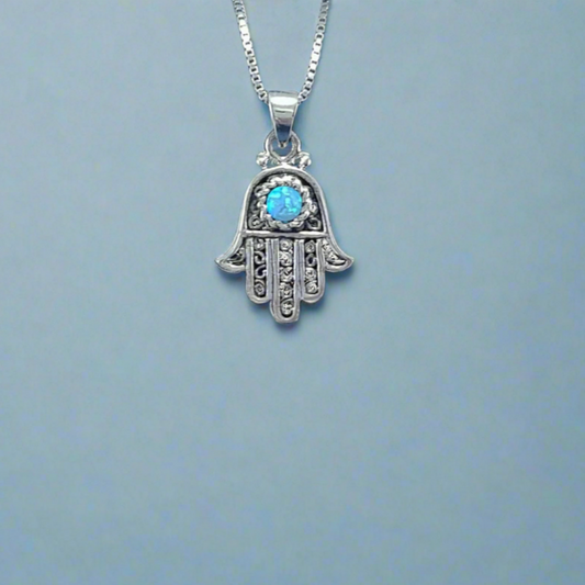 Sterling Silver Hamsa Hand Pendant in a filigree design with crushed opal inlay