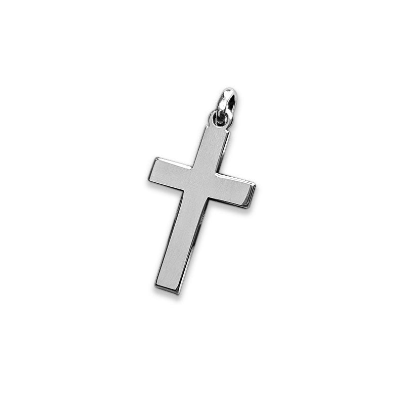 Silver cross pendant on a white background