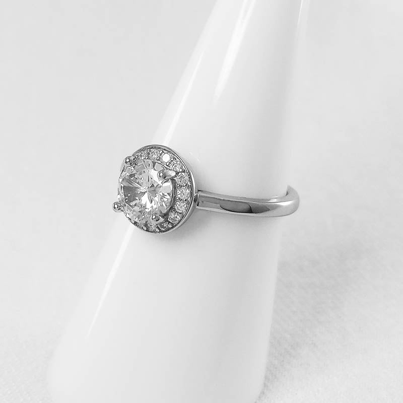 Sterling Silver Halo Ring With CZ Stones