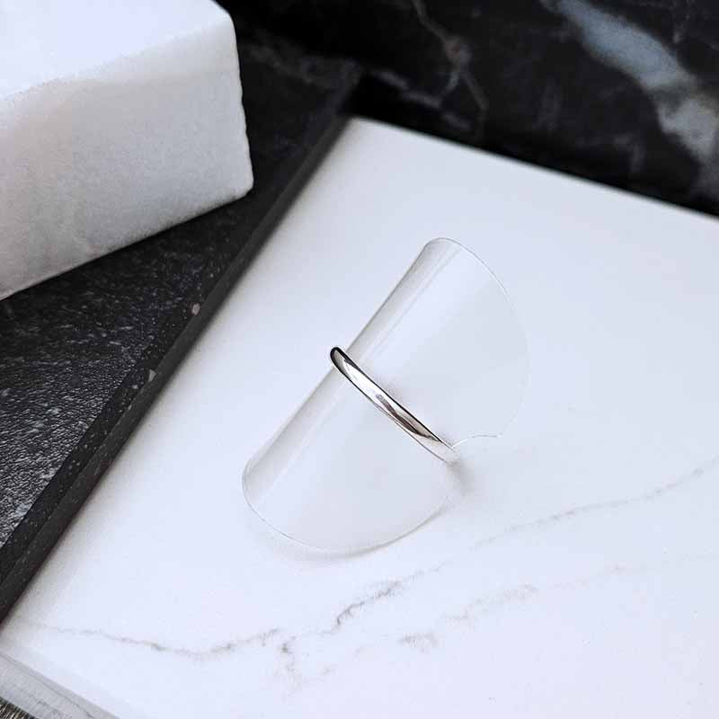 Sterling Silver Plain Band  on a marble surface
