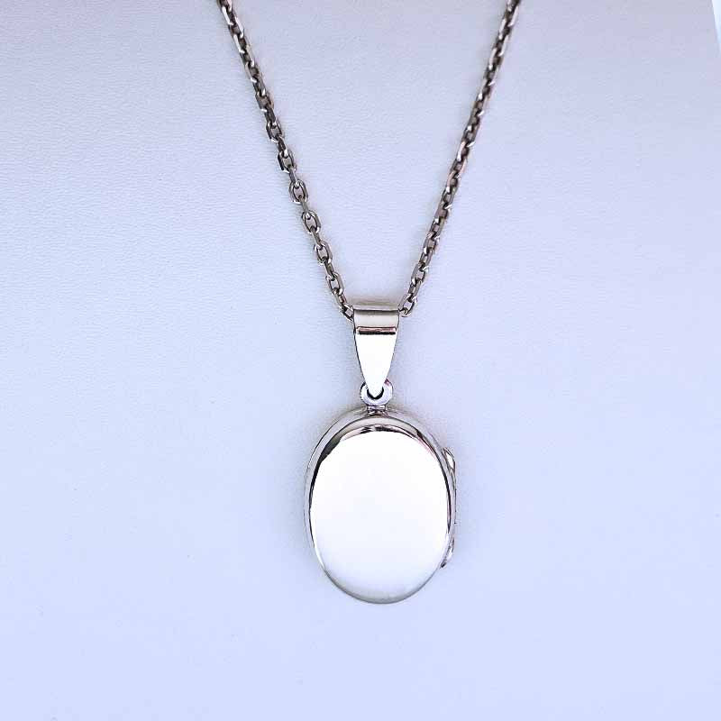 Silver Locket necklace on a white background