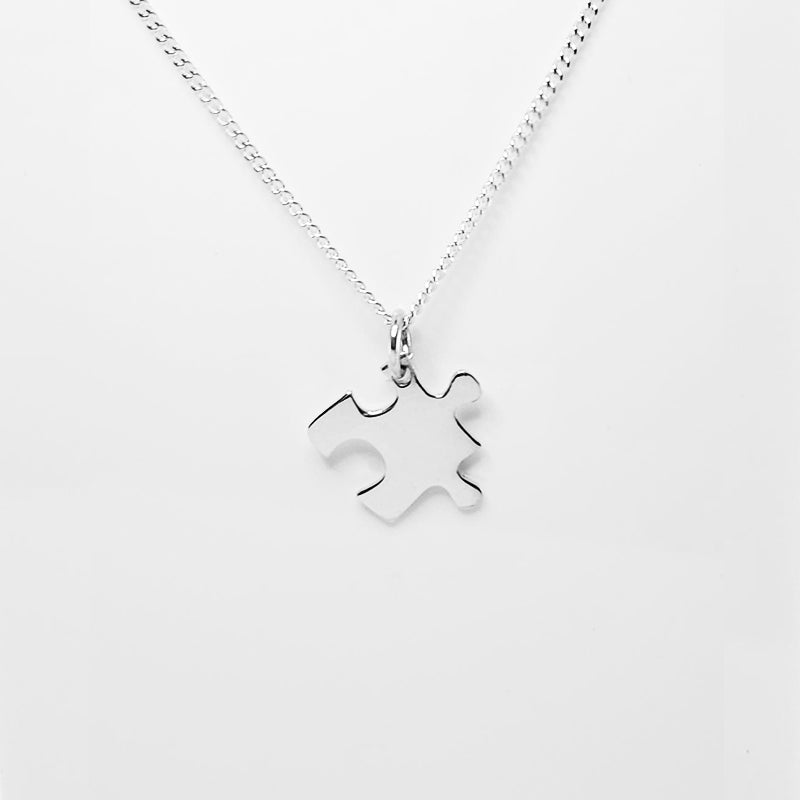 Silver Puzzle Piece Charm with a silver chain