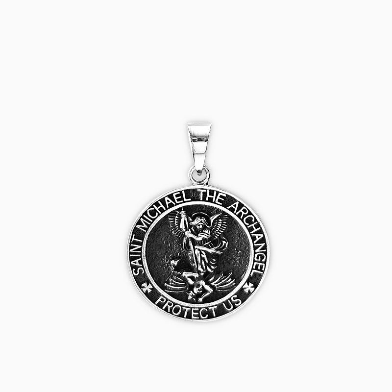 Silver pendant with 'Saint Michael the Archangel' engraving on a white background