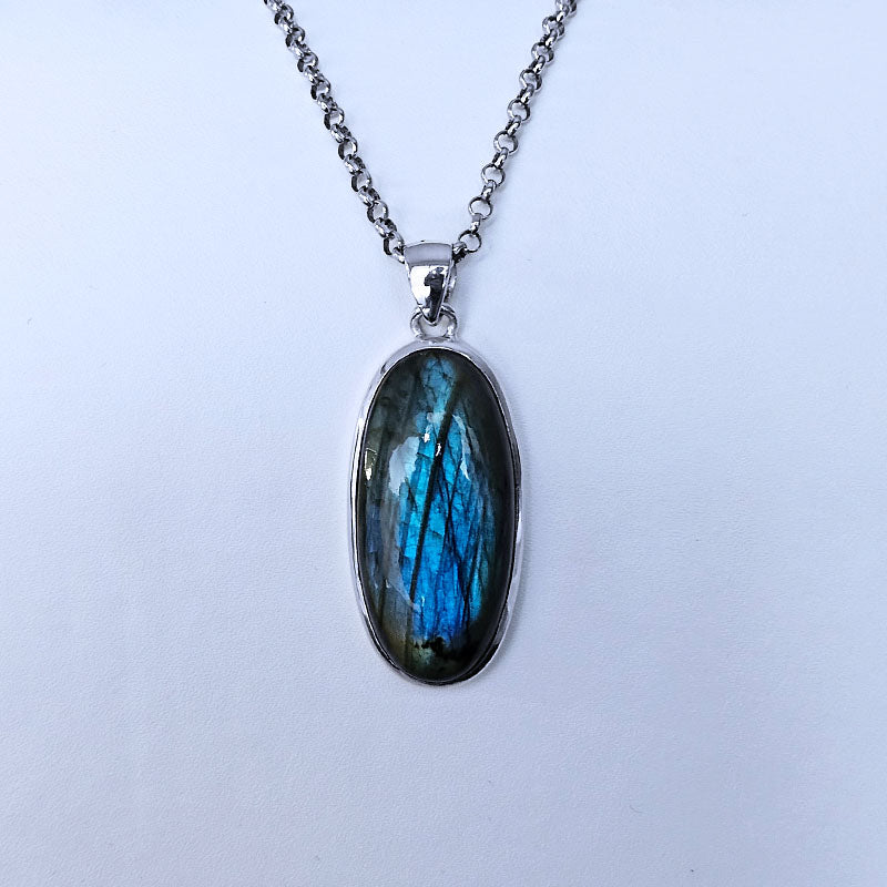 Necklace with a Labradorite pendant on a white background