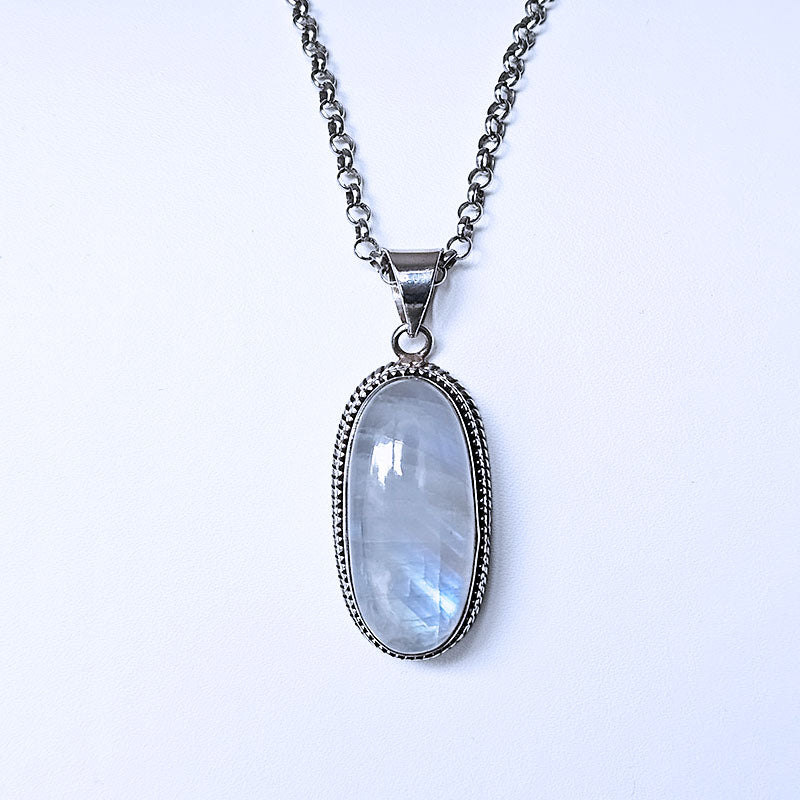 Necklace with an oval pendant on a white background