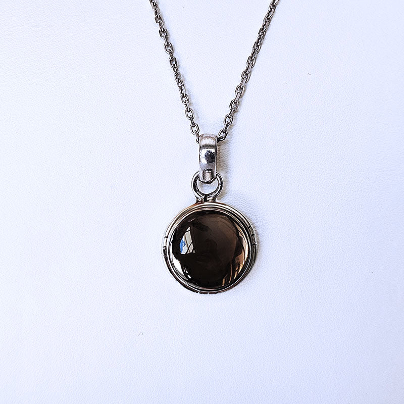 Sterling silver pendant with a smokey quartz stone