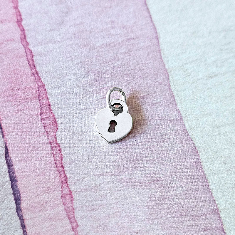 Silver heart-shaped padlock charm