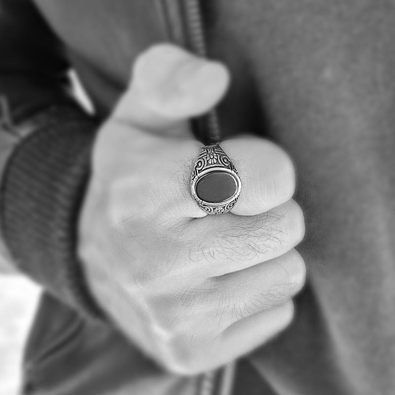 Silver ring for men with textured pattern and black onyx stone