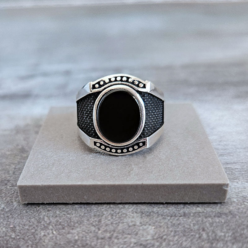 Silver ring for men with oxidised details and flat onyx stone