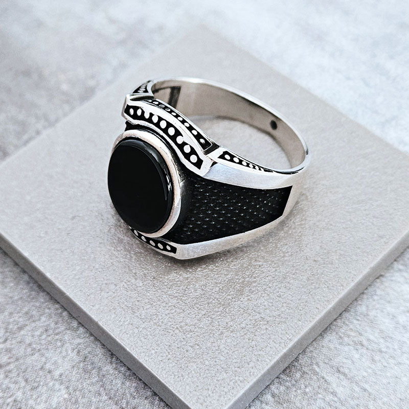Silver ring for men with oxidised details and flat onyx stone