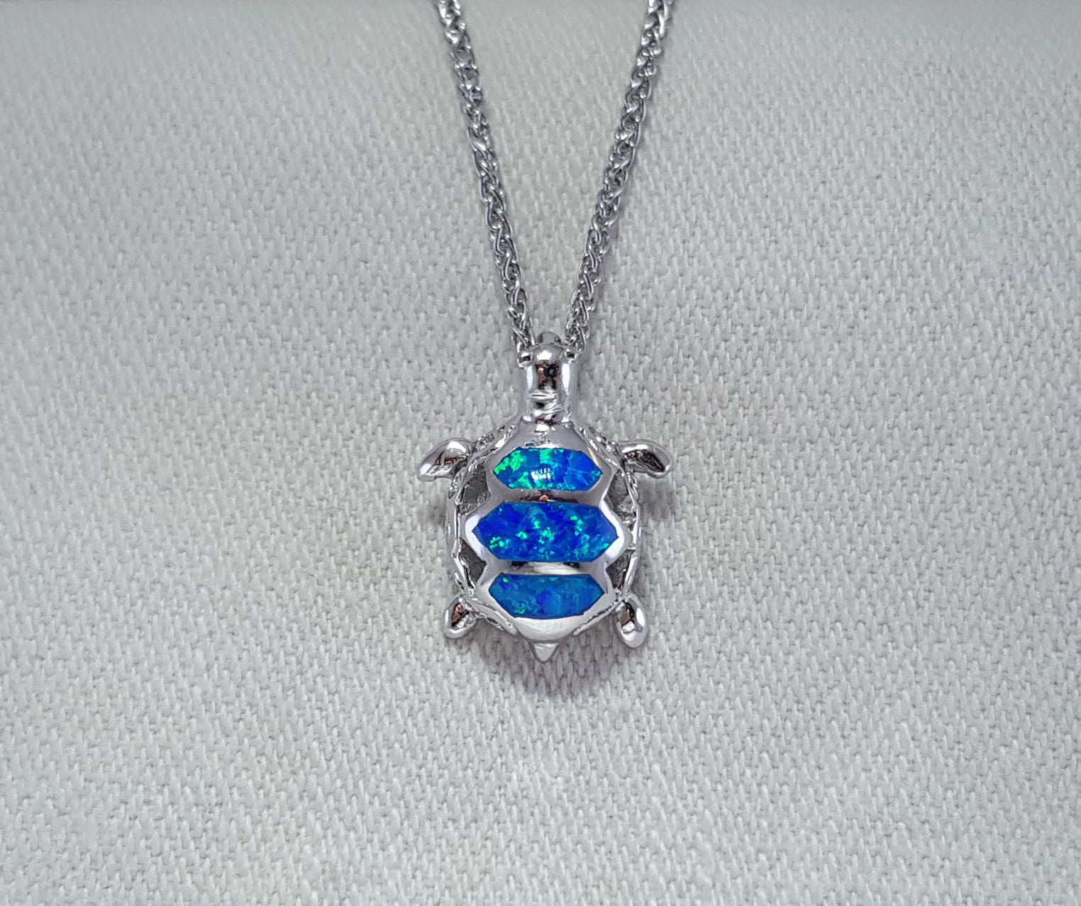 Crushed Opal tortoise pendant set in Sterling Silver 