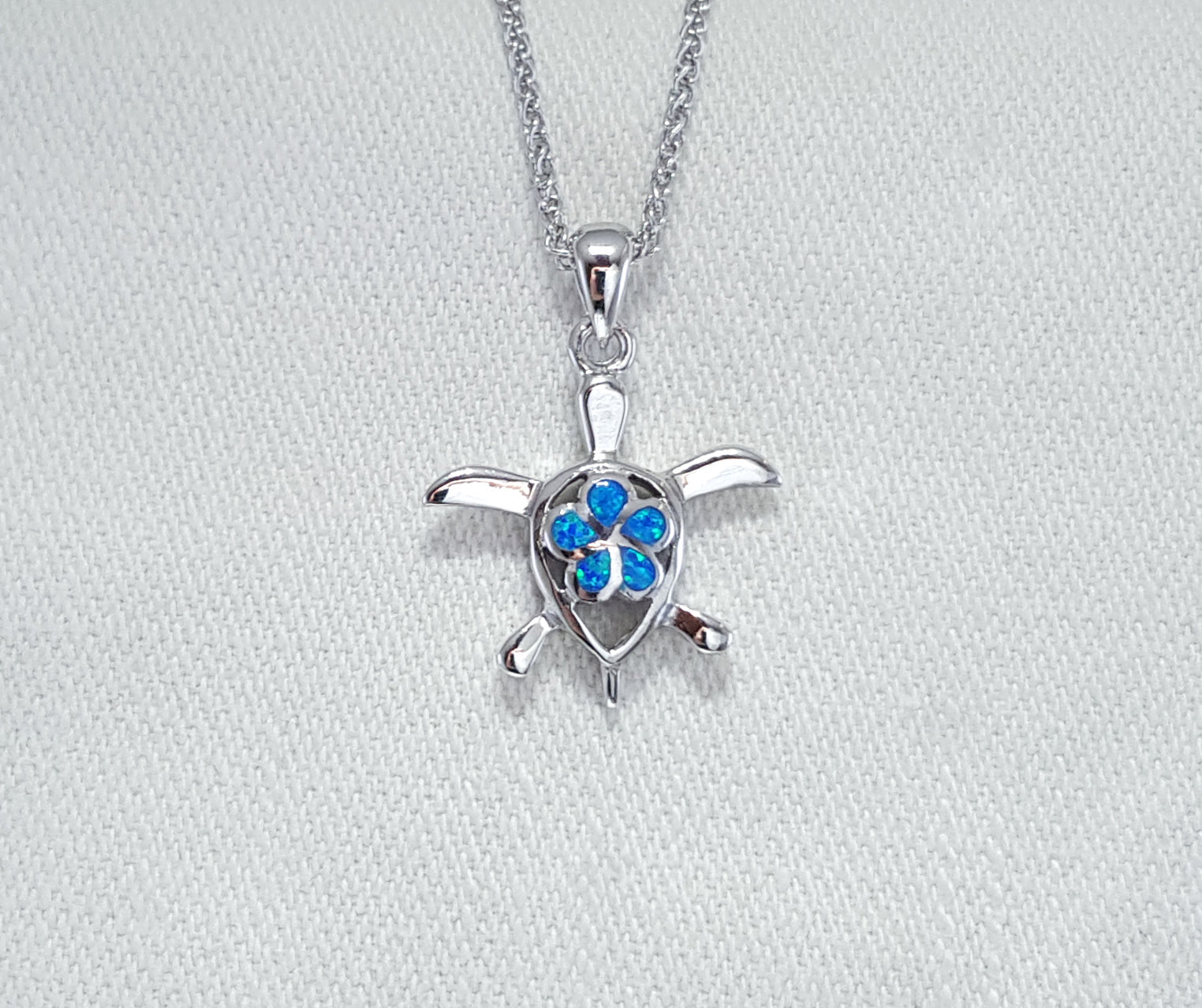 Crushed Opal turtle pendant set in Sterling Silver 