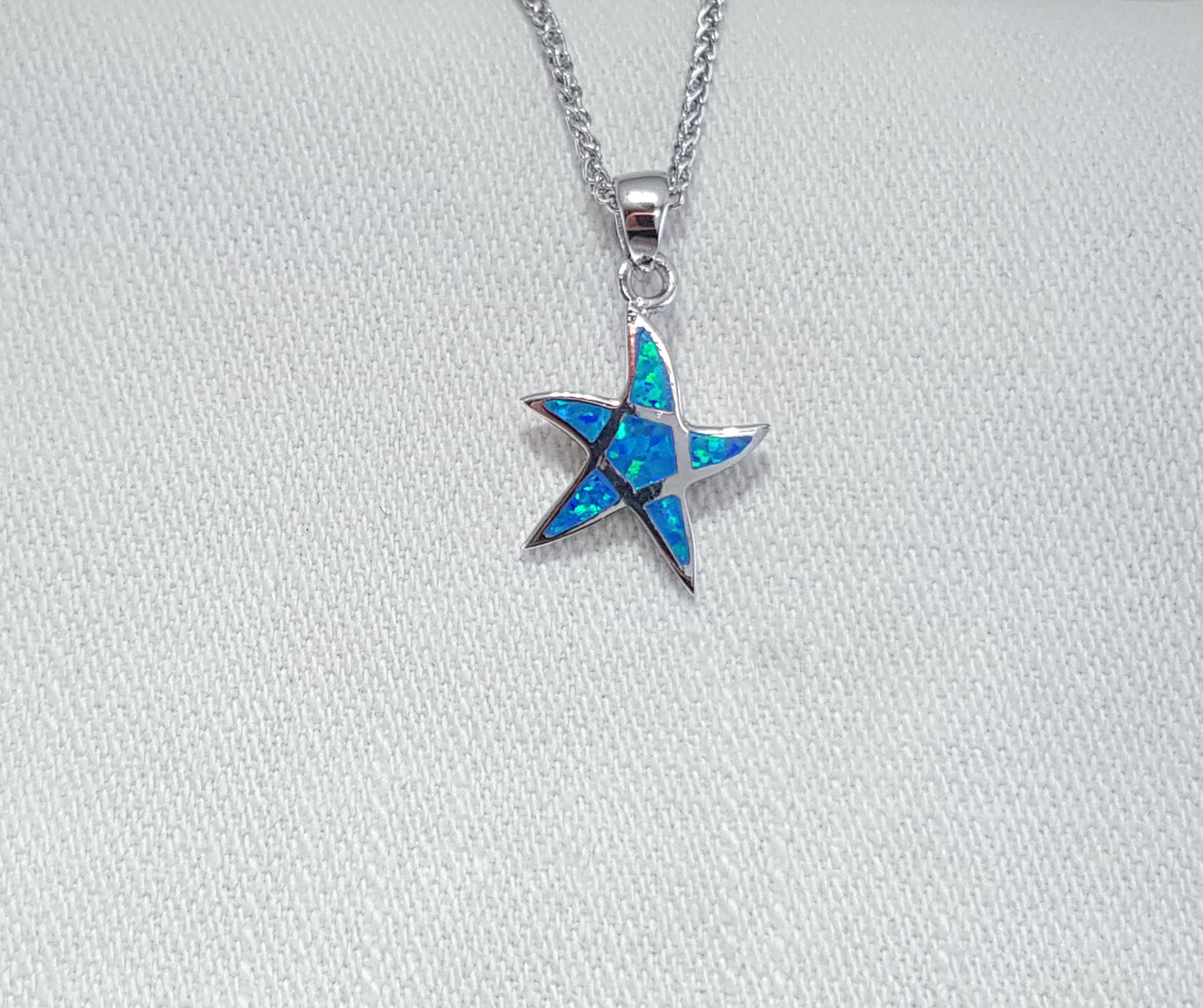 Crushed Opal starfish pendant set in Sterling Silver 