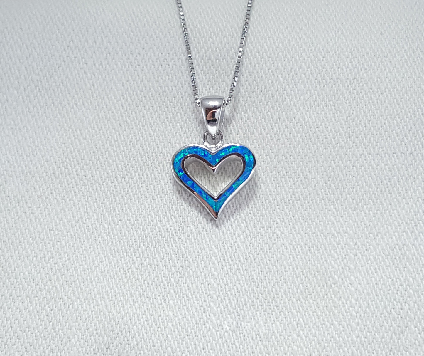 Crushed Opal heart pendant set in Sterling Silver 