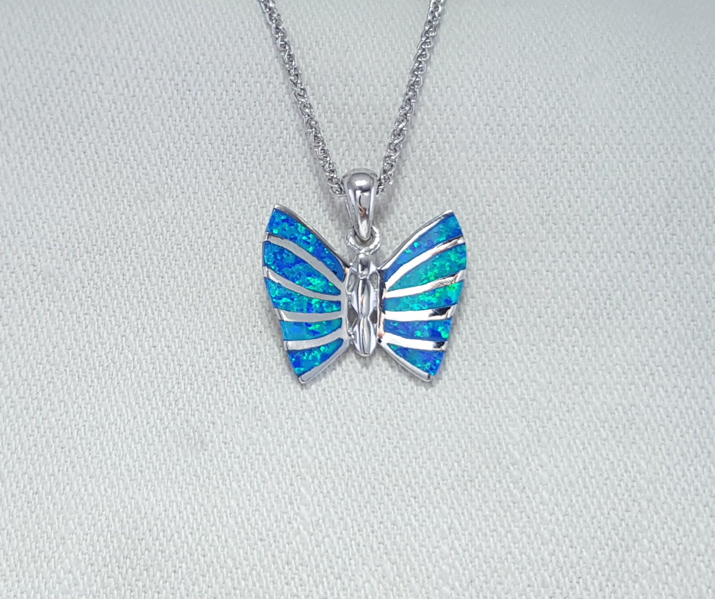 Crushed Opal butterfly pendant set in Sterling Silver 