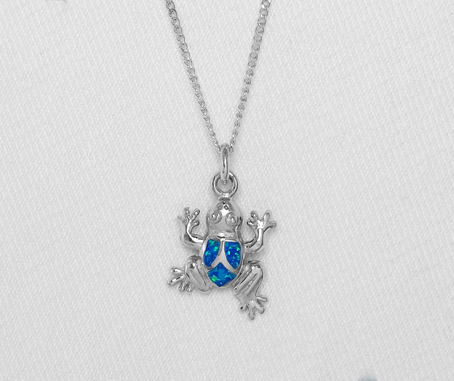 Sterling Silver Frog Pendant With Blue Crushed Opal inlay