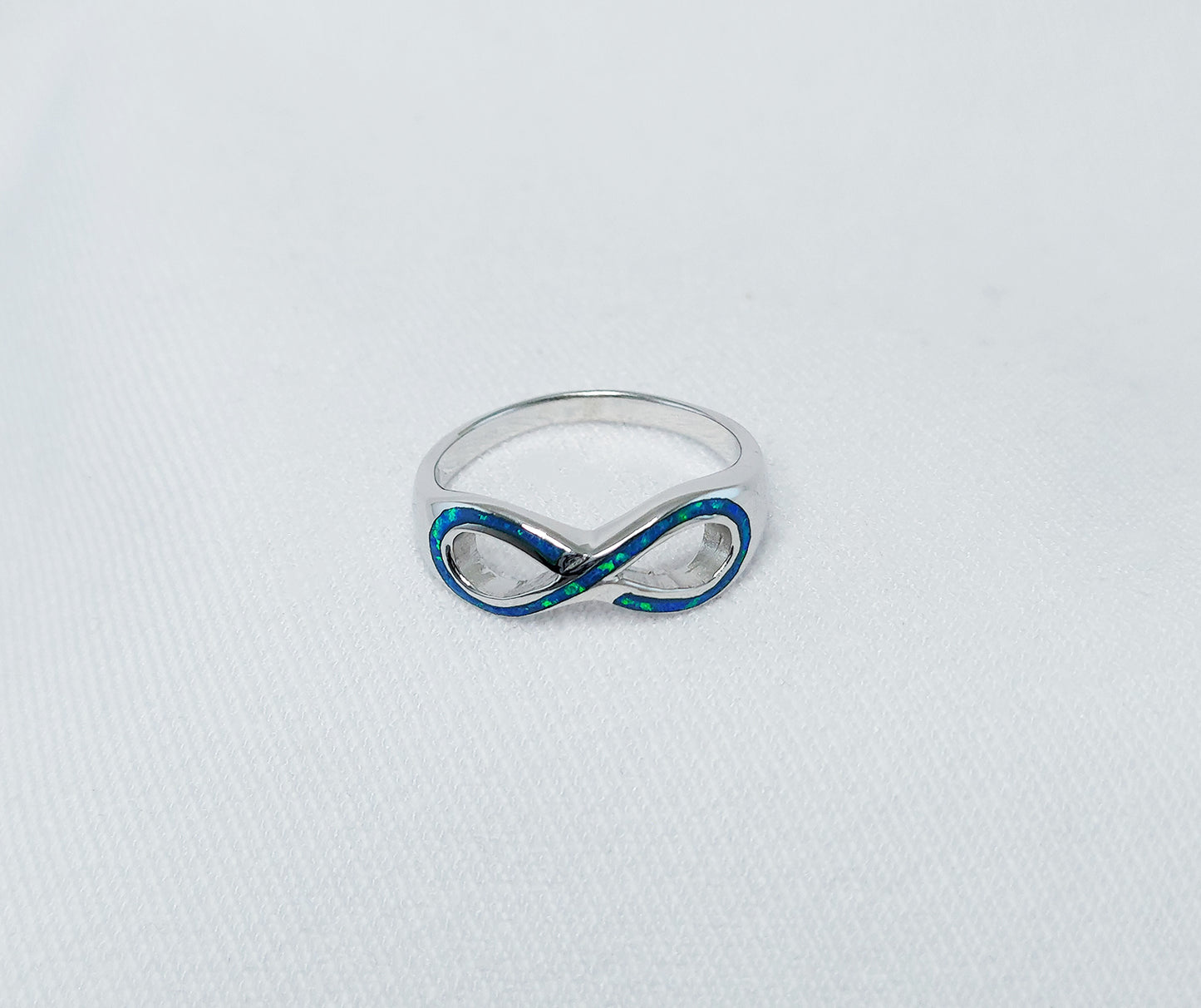 Sterling Silver Blue Crushed Opal Infinity Ring