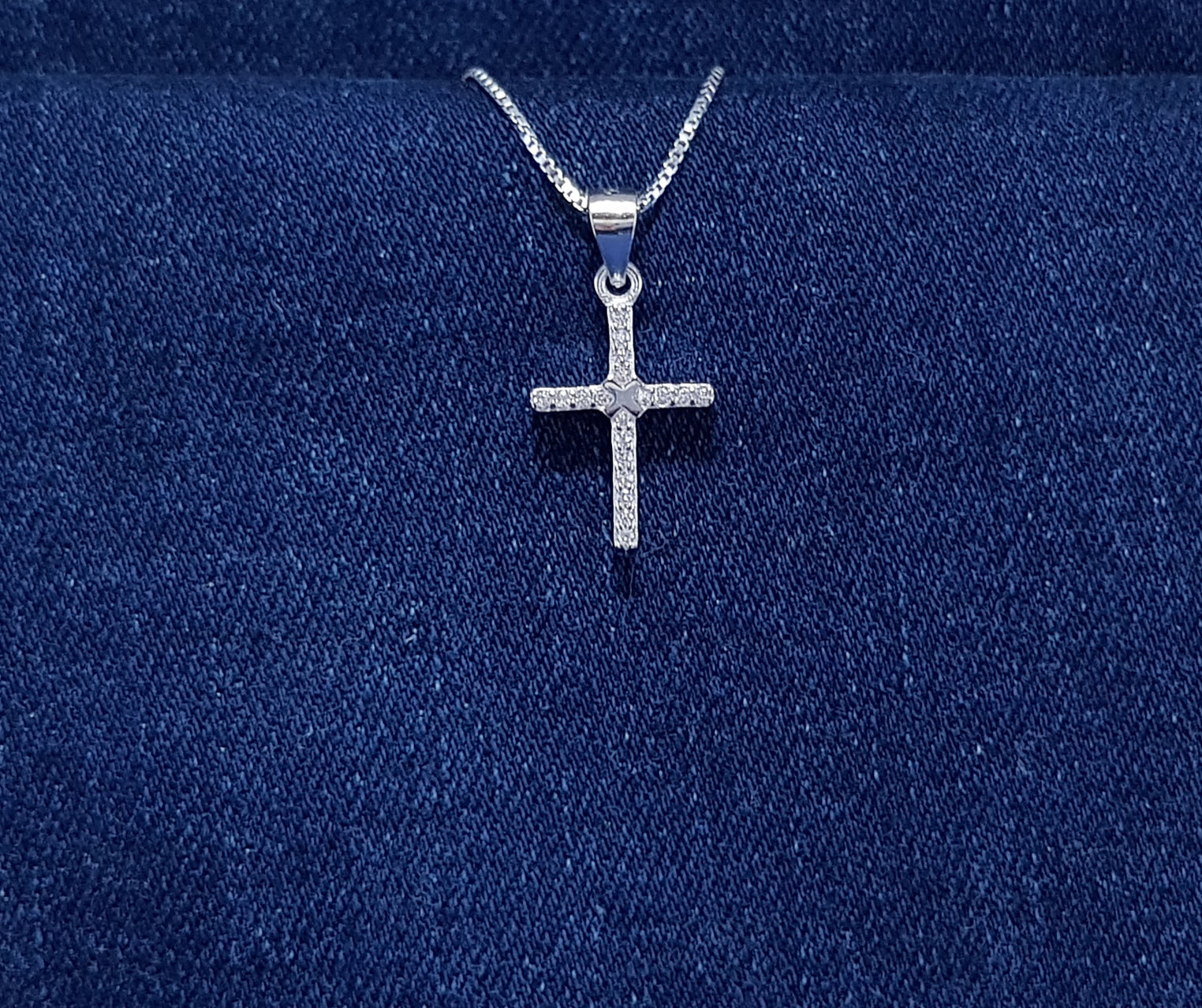 Sterling silver cross with cubic zirconia stones - central design 