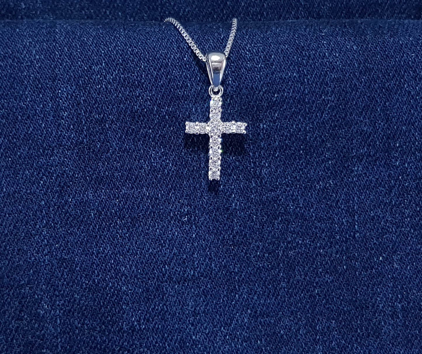 Sterling silver cross with cubic zirconia stones - claw setting