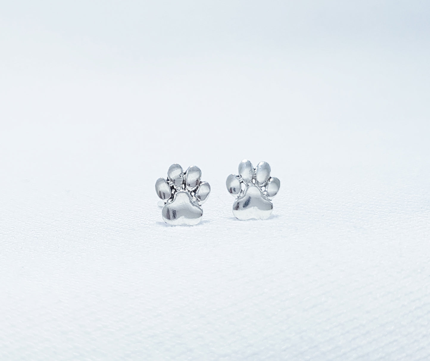 sterling silver paw print studs