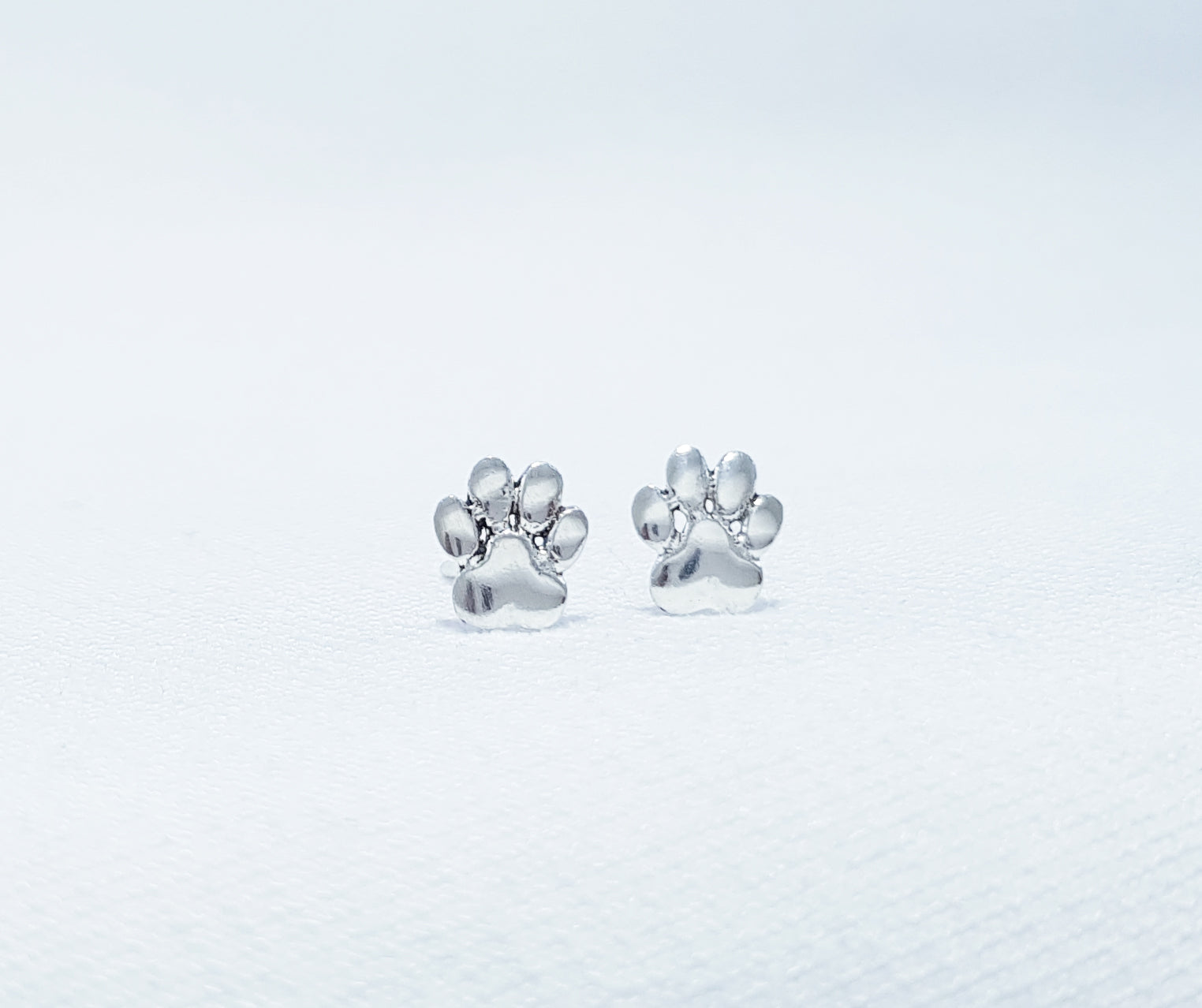 sterling silver paw print studs