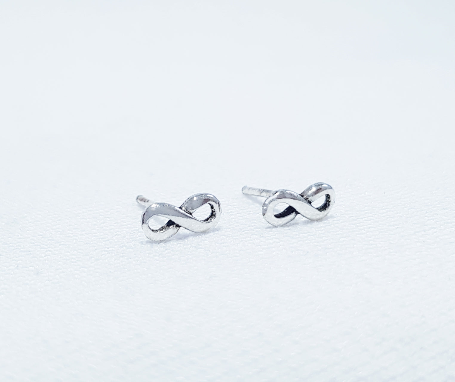 sterling silver infinity stud earrings