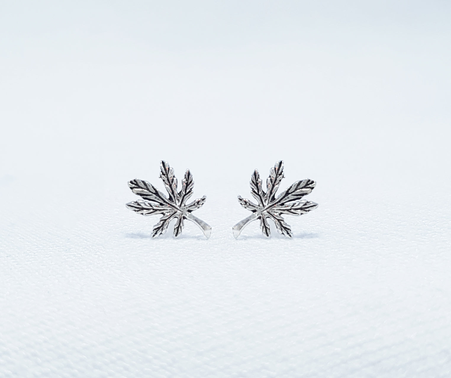 sterling silver marijuana leaf stud earrings