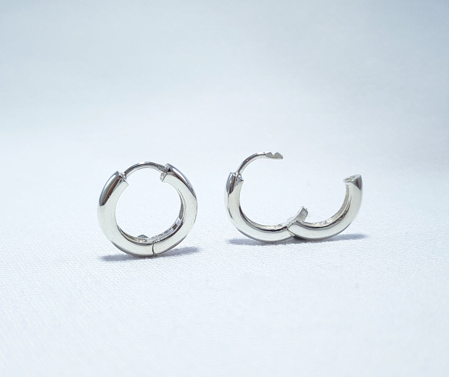 Sterling Silver Huggie Earrings - round profile