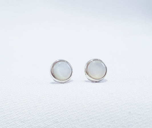 Large mother of pearl stud earrings, showcasing the iridescent beauty of natural mother of pearl.