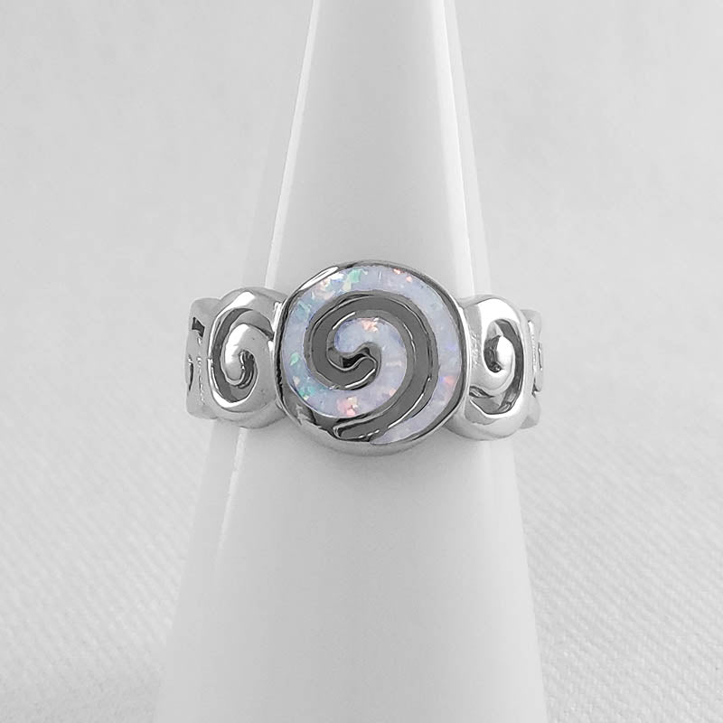 Sterling silver spiral ring with white opal