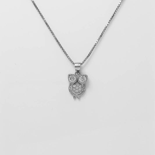sterling silver owl charm with cubic zirconia stones and a silver chain.