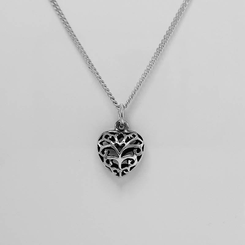 Sterling Silver Filigree Heart Pendant with a silver chain