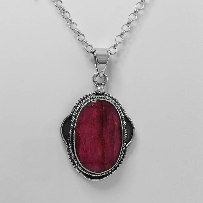 Sterling Silver Indian Ruby Pendant with a silver chain.