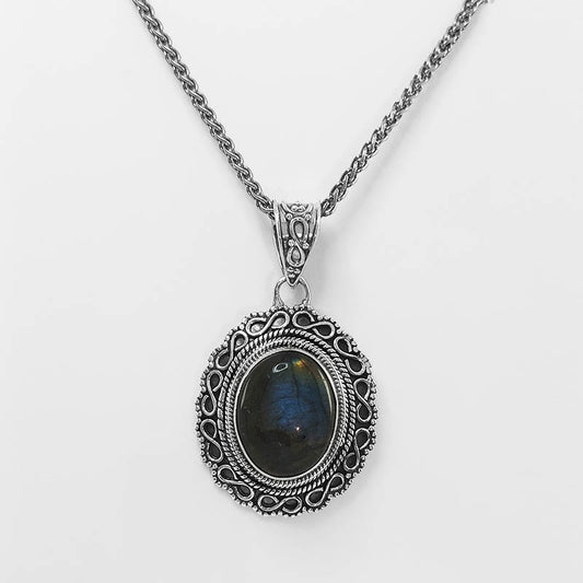 A sterling silver Labradorite pendant with a silver wheat chain.