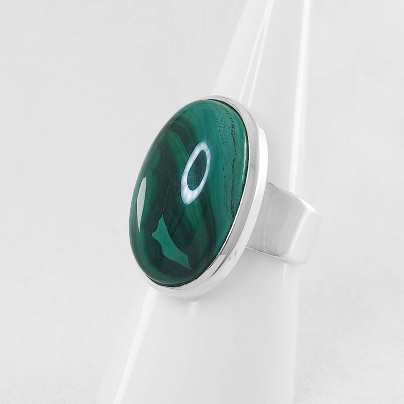 Sterling silver ring with an oval Malachite stone